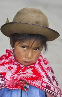 Images Dated 2027: Portrait of young girl with traditional dress in small town of Pisaq Peru South America