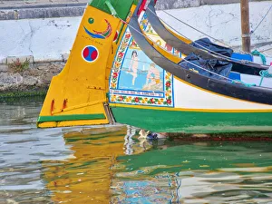 Images Dated 21st December 2020: Portugal, Aveiro. Moliceiro boats along the main canal of Aveiro