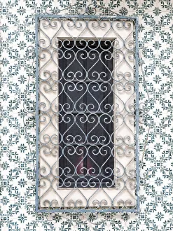 Wrought Iron Prints: Portugal, Aveiro. Shuttered window on tiled wall with wrought iron covering