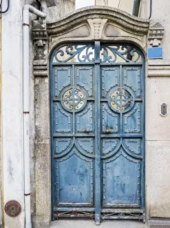 Unique Prints: Portugal, Aveiro. A unique metal door on a home in the streets of Aveiro