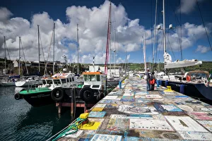 Marina Prints: Portugal, Azores, Faial Island. Horta Marina with paintings by yacht crews on its piers