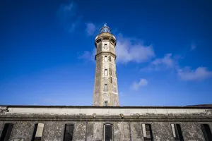 Images Dated 10th May 2017: Portugal, Azores, Faial Island. Capelinhos volcanic eruption site and lighthouse