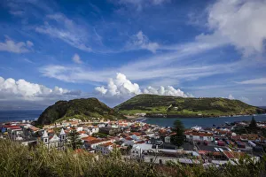 Portugal, Azores, Faial Island, Horta. Elevated view of Porto Pim, Monte Quelmado