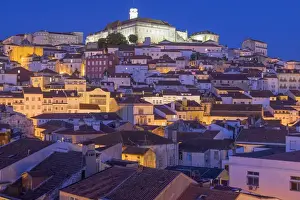 Images Dated 6th July 2015: Portugal, Coimbra. Hillside view of houses and the University of Coimbra neighborhood