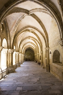 Images Dated 7th July 2015: Portugal, Coimbra. Old Cathedral cloister. Archways, walking paths, courtyard