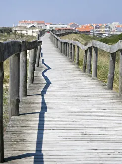 Beach Resort Prints: Portugal, Costa Nova. Beach and board walk at Costa Nova beach resort near Aveiro