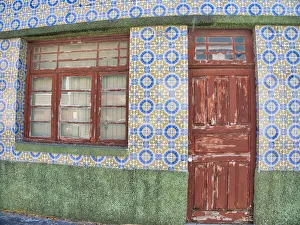 Images Dated 21st December 2020: Portugal, Costa Nova. Colorful houses Palheiros striped homes