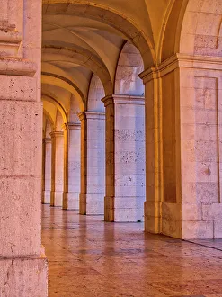 Lisbon Prints: Portugal, Lisbon. Columns of the Arcade of Commerce Square with evening light