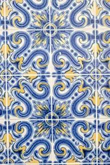 Lisbon Prints: Portugal, Lisbon. Door way with blue and yellow tile work (Azulejos) in the historic