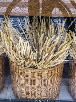 Basket Prints: Portugal, Lisbon. Dried wheat stalks in the window of a bakery