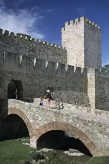 Children Prints: Portugal, Lisbon, Mother and children cross over moat to Castelo (castle) de Sao Jorge