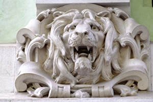 Stone Carving Prints: Portugal, Lisbon. Pombaline district, stone faces and animal heads adorn pastel colored