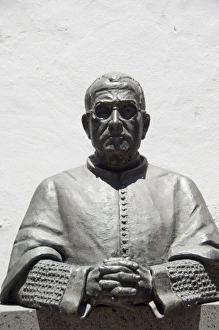 Images Dated 29th May 2010: Portugal, Madeira Island, Funchal. Bronze of Dr. Francisco Andrade in front of Gothic
