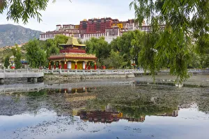 Potala Palace (UNESCO World Heritage site) with reflection in the lake water, Lhasa