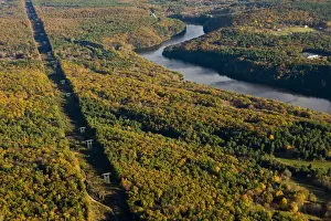 Reservoir Prints: Power lines cut a swath through the forest next to the Connecticut River in Gill