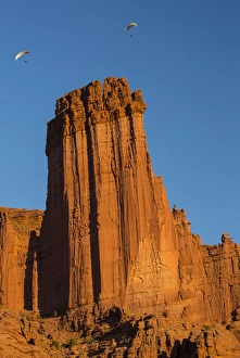 Red Rock Prints: Powered Paragliders above and around Fisher Towers, Utah in evening light