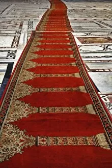Prayer rugs leading into Islamic mosque, Cairo, Egypt