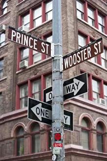 Prince Street and Wooster street signs in the Cast Iron HIstorical district of SoHo