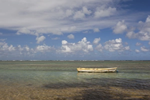Puerto Rico, East Coast, Luquillo, Playa Luquillo Beach, seascape with small boat
