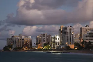 Images Dated 17th December 2009: Puerto Rico, San Juan, Condado, Condado high rise buildings and Condado Beach, dusk