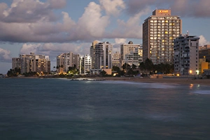 Images Dated 17th December 2009: Puerto Rico, San Juan, Condado, Condado high rise buildings and Condado Beach, dusk