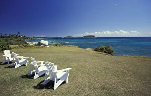 Puerto Rico, Vieques Island. Private beach and chairs facing the ocean
