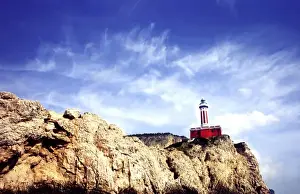 Isle Of Capri Prints: The Punta Carena lighthouse looks out on the Bay of Naples from the Isle of Capri