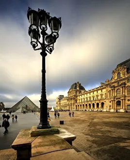 Louvre Prints: Pyramid and courtyard to the Louvre in Paris, France