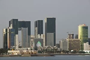 Images Dated 15th February 2007: Qatar, Ad Dawhah, Doha. West Bay Development along the Corniche / Dusk