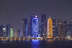 Qatar Collection: Qatar, Doha, Doha Bay, West Bay skyscrapers dawn, with World Trade Center in blue