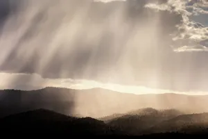 Painted Hill Prints: Rain Veils Over the Ochoco Mountains near Mitchell, Oregon, USA