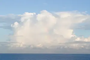 West Indies Prints: A rainbow in cumulus clouds forming over the Caribbean Sea near Barbados