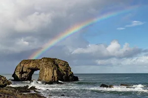 Images Dated 2023: Rainbow over The Great Pollet Sea Arch in County Donegal, Ireland