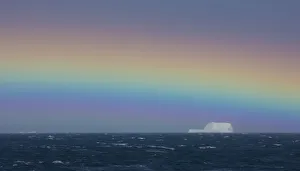 Antarctica Prints: Rainbow over iceberg, South Georgia in the South Atlantic Ocean