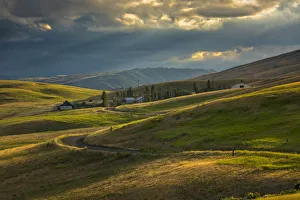 Painted Hill Prints: Ranch nestled in the rolling hills near Painted Hills, Oregon at sunset