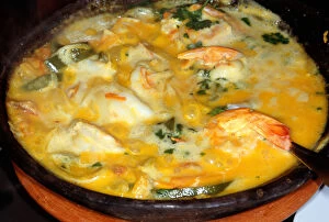 Images Dated 19th March 2007: Recife, Brazil. Muqueca de Peixe fish stew with prawns in an earthenware dish