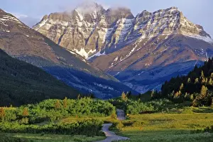 Roadway Prints: Red Rock Parkway winds to Blakiston Mountainin Waterton Lakes National Park in Alberta