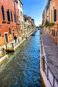 Venetian Prints: Reflection of buildings and boats, Venice, Italy