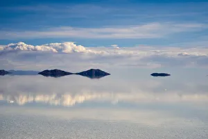 Bolivia Prints: Reflection of clouds on the surface of the salt flat covered with water, Salar de Uyuni