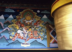 Images Dated 26th October 2009: religious painting and prayer wheel, Bhutan