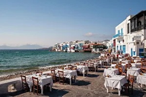Mykonos Prints: Restaurant tables on the seaside in the Little Venice neighborhood