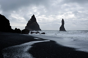 Dark Prints: Reynisdrangar, Vik, Iceland. Black sand beach in the southern most village in Iceland