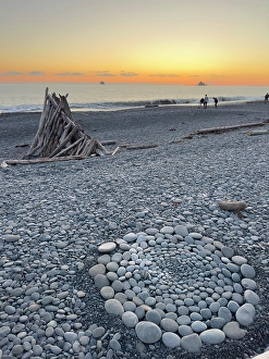 Prints of Rialto Beach, Olympic Peninsula, Washington State. Pebbles arranged in a circle on the beach. Sunset Images Dated 2024 September: Rialto Beach, Olympic Peninsula