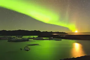 Aurora Prints: Rising moon and Aurora Borealis and moonrise over icebergs in Jokulsarlon and Breidamerkurjokull