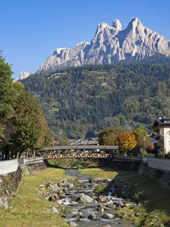 Dolomite Prints: River Cismon, in the background Pale di San Martino. Fiera di Primiero in the valley of