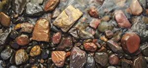 River rocks naturally polished in Lower Deschutes River, Central Oregon, USA