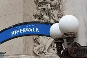 Bas Relief Prints: Riverwalk signage along the Chicago River in downtown Chicago with Michigan Avenue McCormick Bridgehouse bas-relief