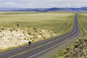 Bicycling Prints: Road cycling along Highway 205 between Burns and Frenchglen Oregon (MR)