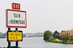 Images Dated 14th May 2004: A road sign at the entrance to the town Tain l Hermitage. Tain laaHermitage