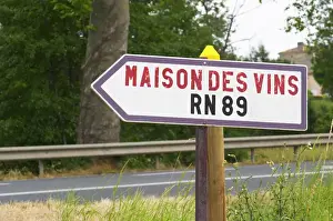 Roadsign Prints: A road sign showing the way to Maison des Vins (the hose of wines) and the RN 89